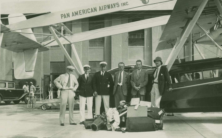 Fairchild Aerial Surveys group posed in front of a plane.